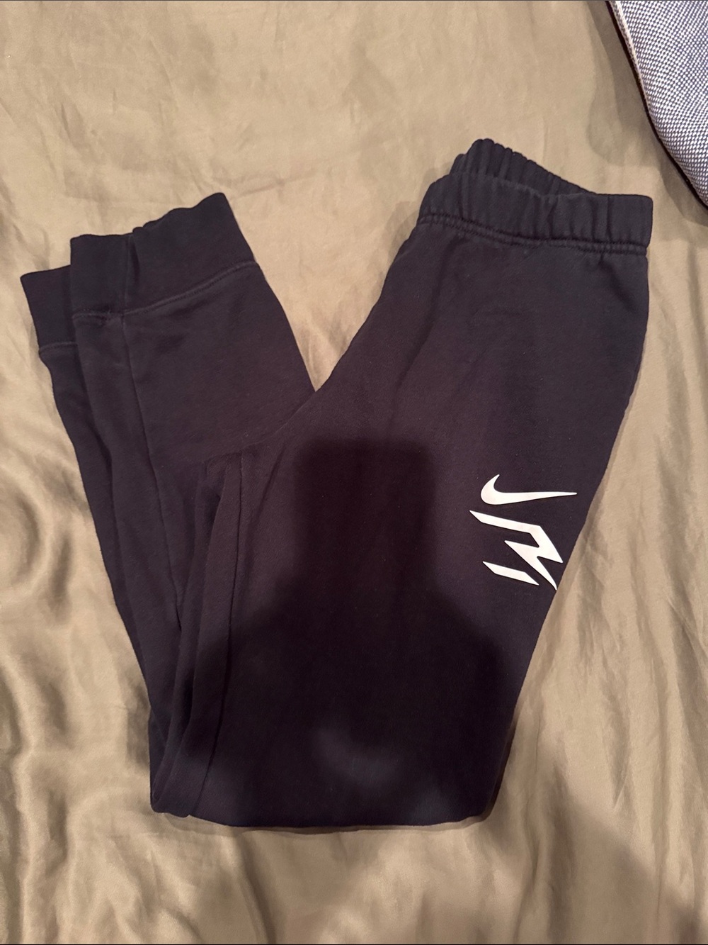 Nike Black Jogger Sweatpants with White Swoosh Graphic